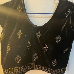 Indian blouse boutique style . Goes with saree.